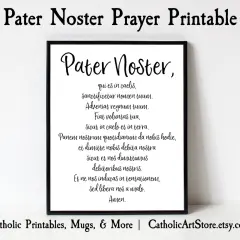Czarna ramka z tekstem "Pater Noster" po łacinie. Modlitwa "Ojcze nasz po łacinie" na białym tle.