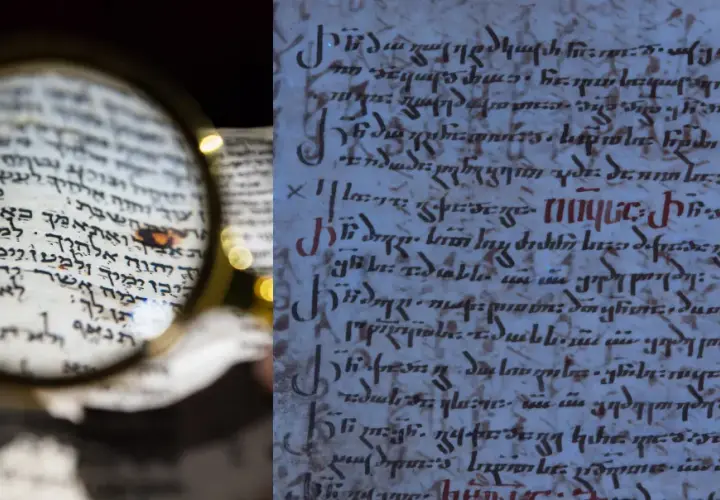 Starożytny manuskrypt z hebrajskimi tekstami, badany przez lupę. Obok fragment starożytnego tekstu w innym języku, być może maur.