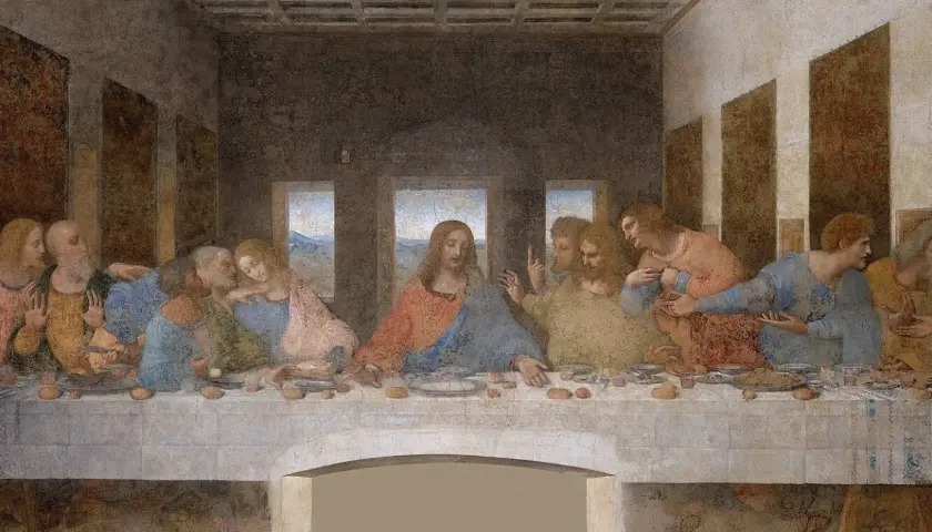 Ostatnia Wieczerza. Jezus pośród dwunastu apostołów, każdy z nich reaguje inaczej na jego słowa.