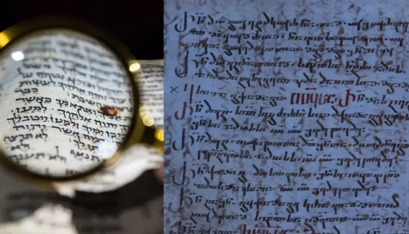 Starożytny manuskrypt z hebrajskimi tekstami, badany przez lupę. Obok fragment starożytnego tekstu w innym języku, być może maur.