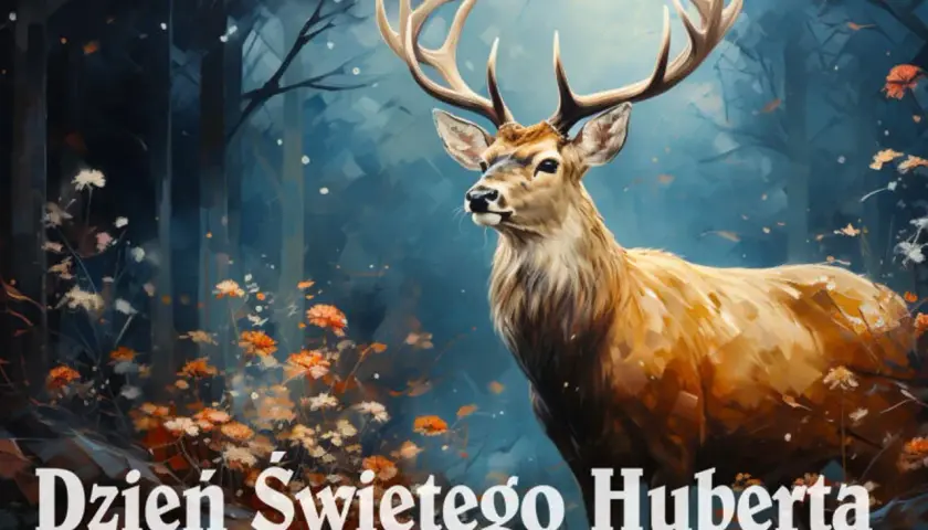 Majestatyczny jeleń w lesie, otoczony jesiennymi kwiatami. 14 listopada to Dzień Świętego Huberta, patrona myśliwych.
