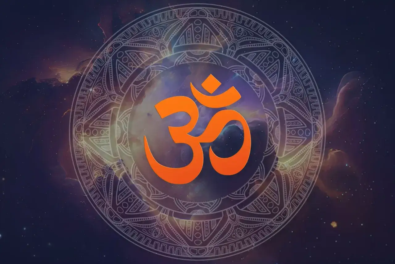 Pomarańczowe Om, symbol hinduizmu, na tle kosmicznej mandali.